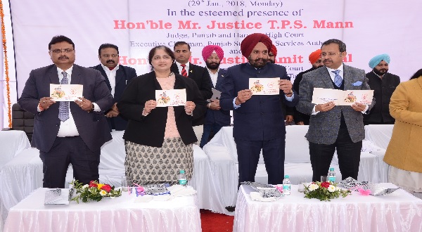 Hon'ble Mr. Justice T.P.S. Mann, Judge, Punjab & Haryana High Court and Executive Chairman, Punjab State Legal Services Authority releasing the Booklet on Government Beneficial Schemes during "CHETNA"-Legal Services
